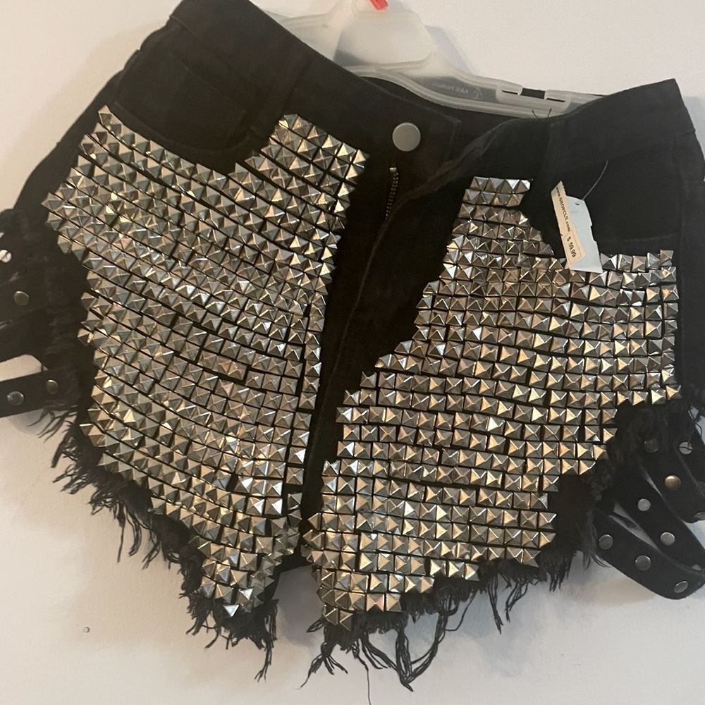 Metallic spiked distressed shorts